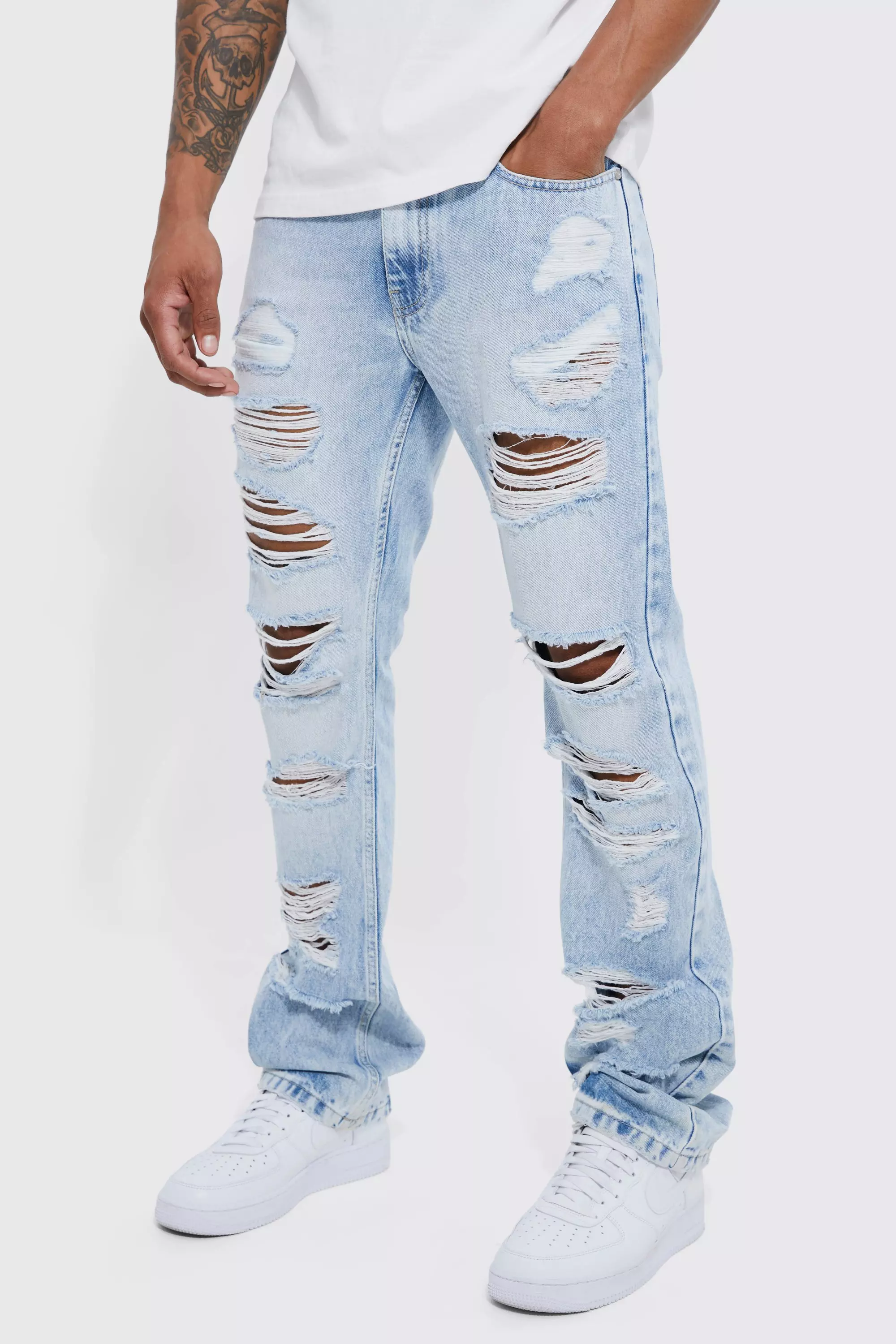 Ripped best sale flare jeans